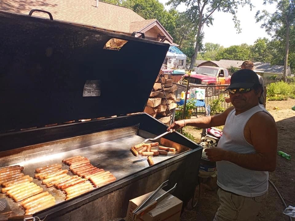 Grilling ribs on outdoor smoker