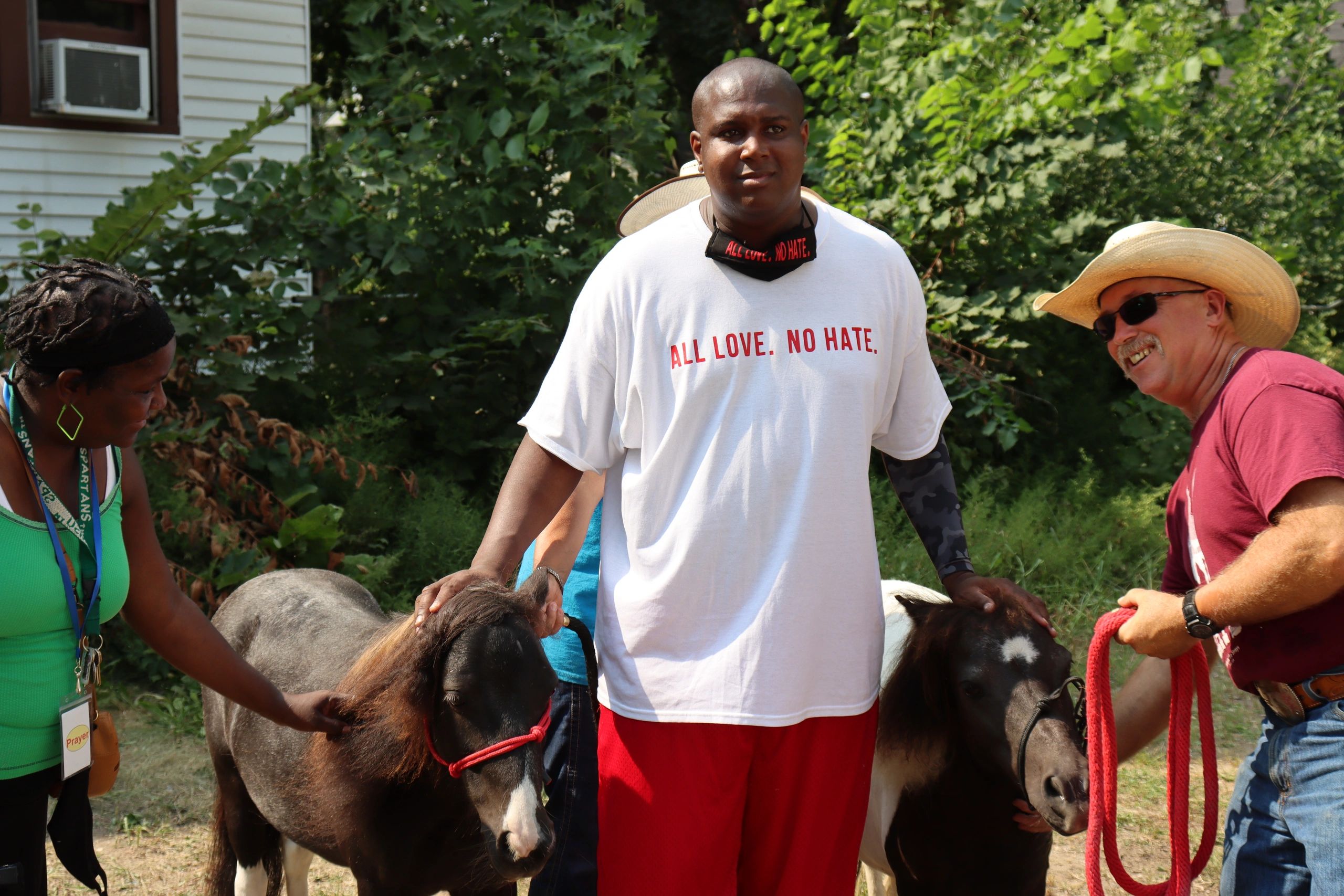 Community members with goats
