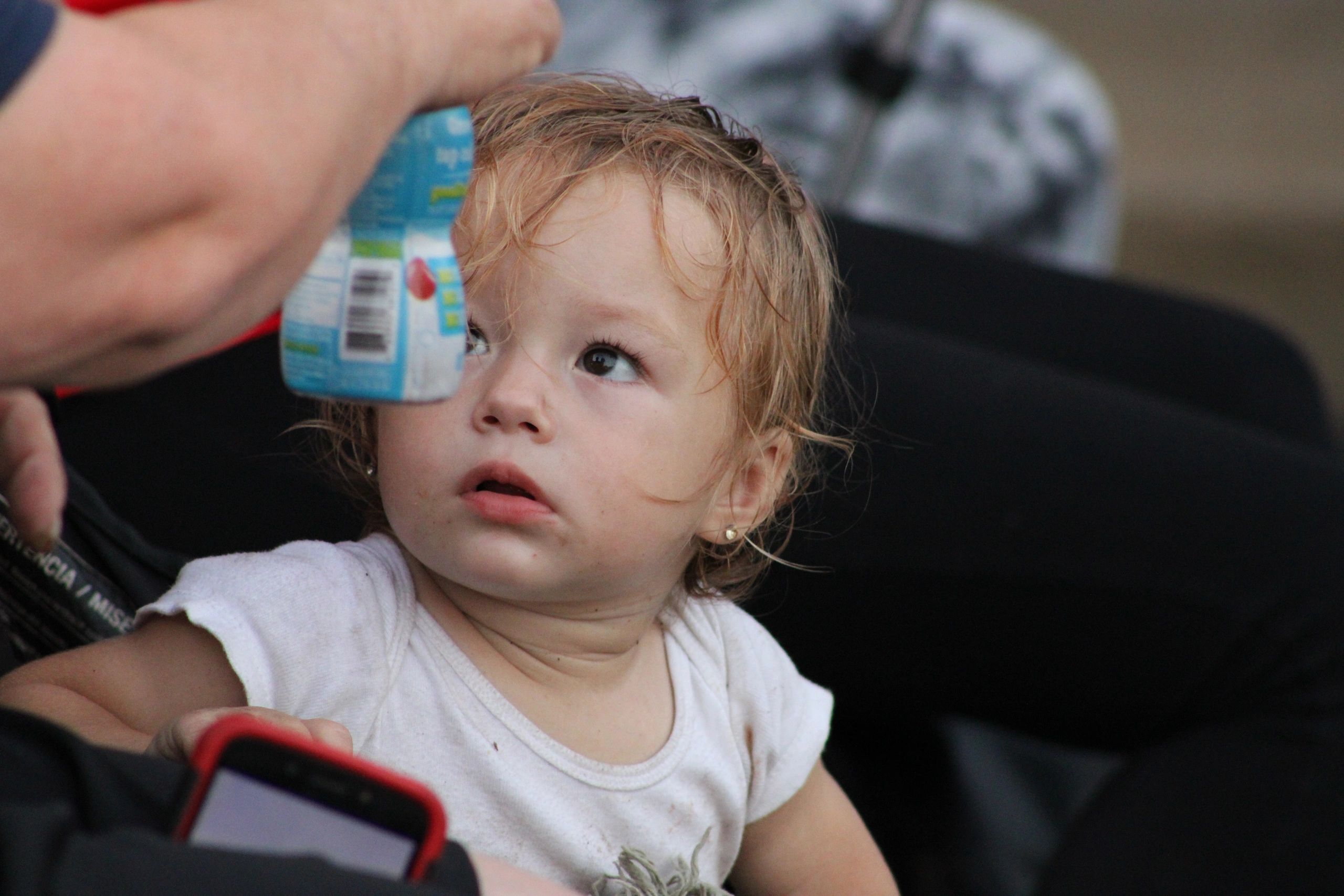Toddler with ice pack on forehead