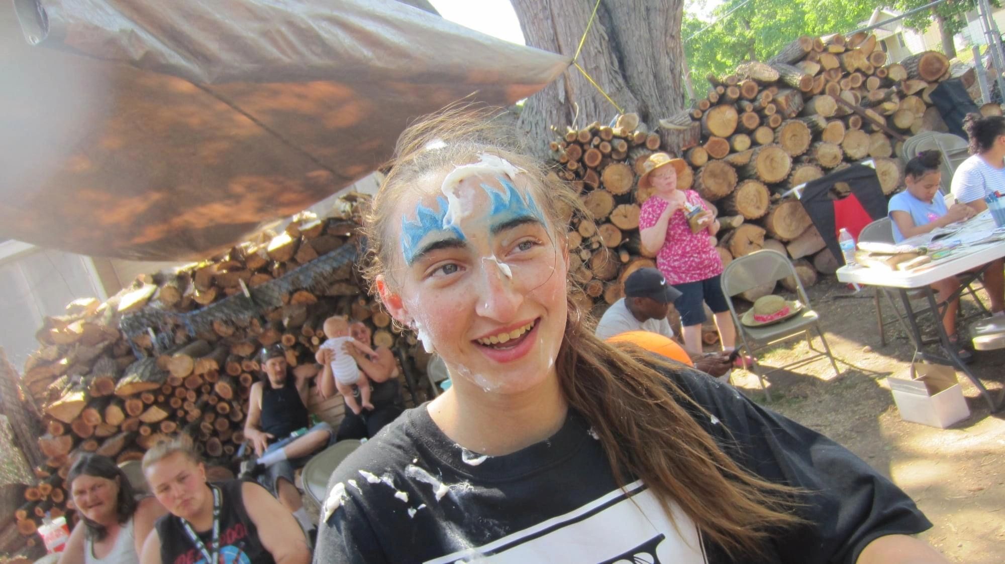 Girl with blue face paint